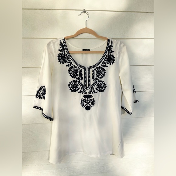 White tunic top from France with navy embroidered detailing. Size small - Picture 1 of 4